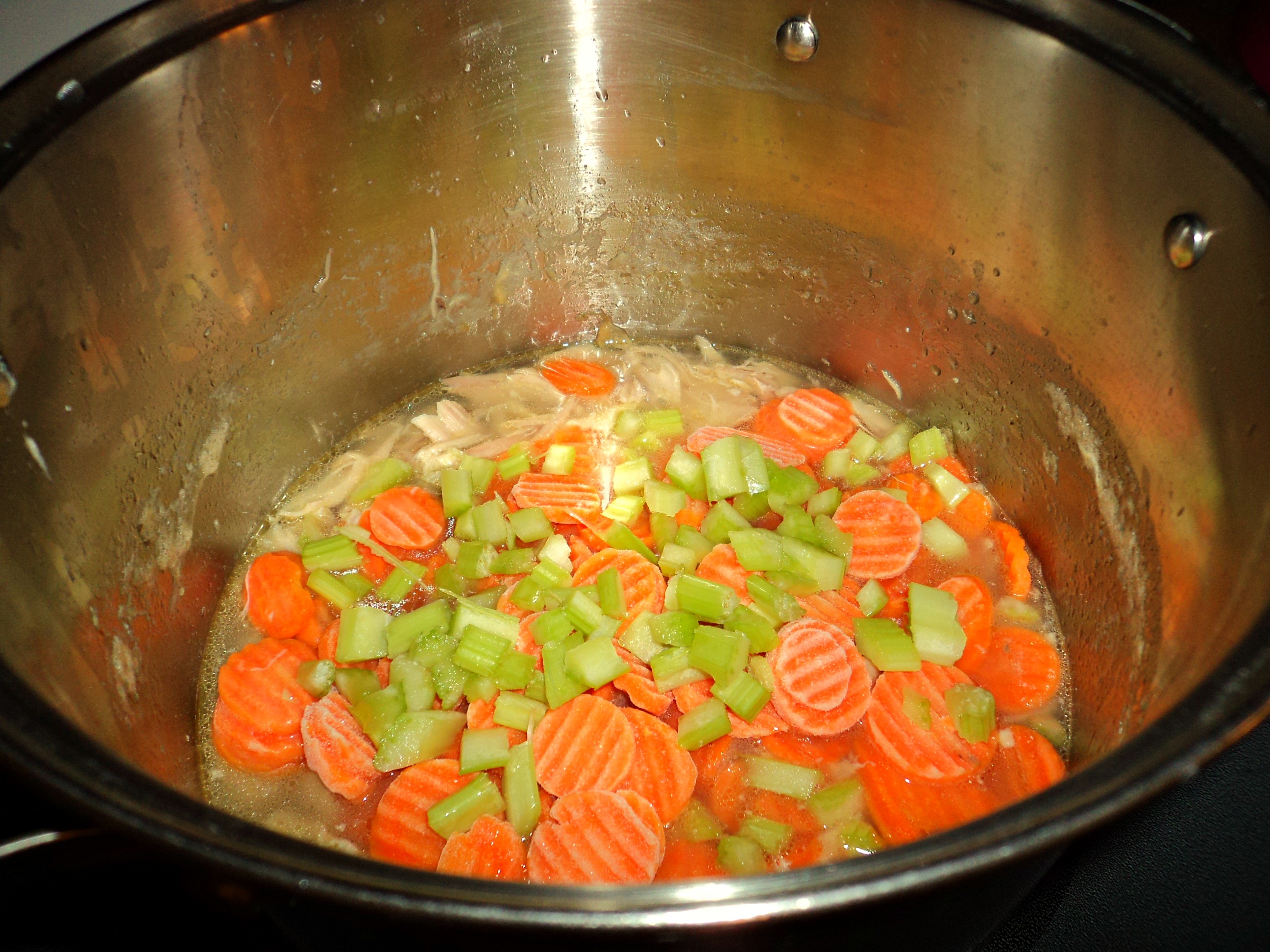 vegetables in pot on stove 