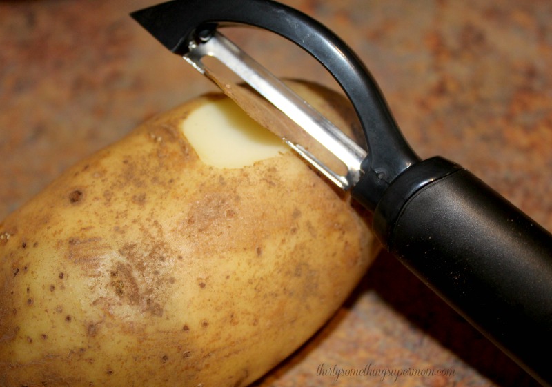 peeling potatoes for stew. 
