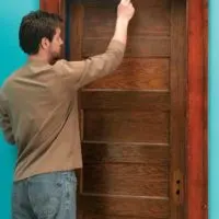Add an elegant touch to any space in your home with this tutorial that teaches you How to Hang a Reclaimed Door in an Existing Jamb.