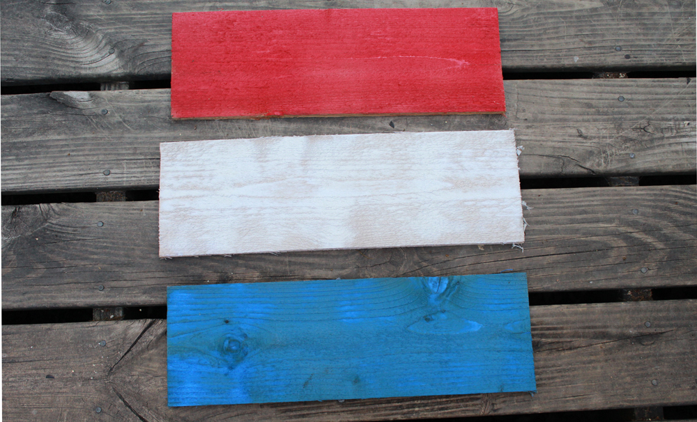 painting red white and blue fence pickets