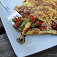 Cheesy Omelet with Peppers and Onions