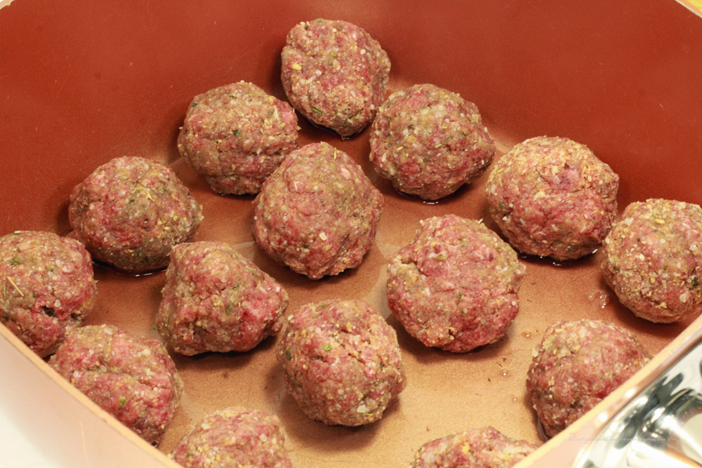 Vension Meatballs baking in oven dish. 