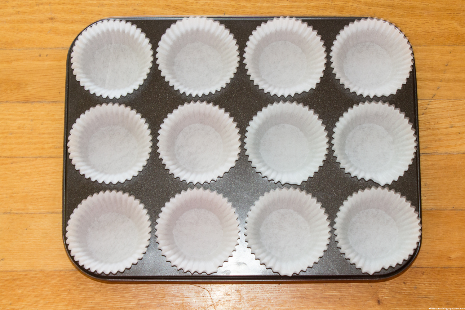 muffin tin with parchement paper liner. 