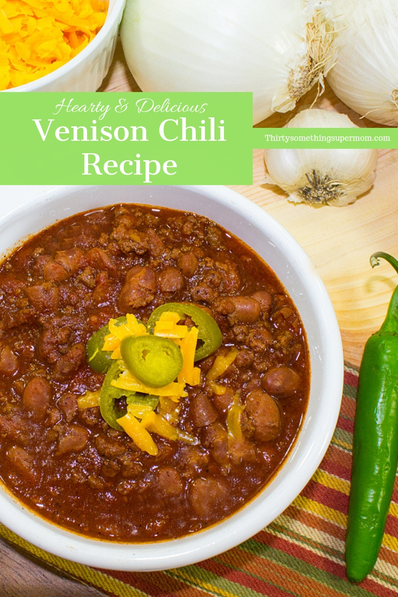 Easy Venison Chili in a bowl with peppers and cheese 