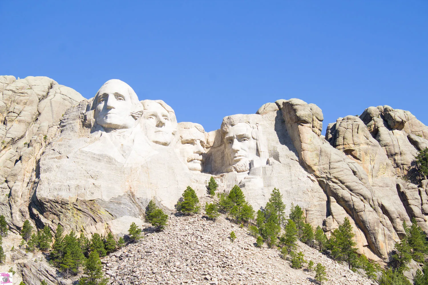 Four presidents carved into a mountain. 