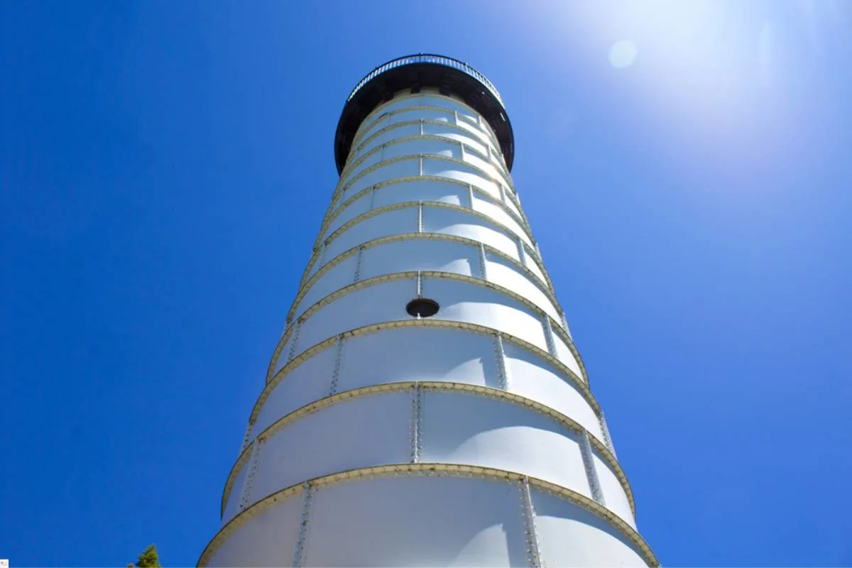 Close-up of Cana Island Lighthouse tower and beacon