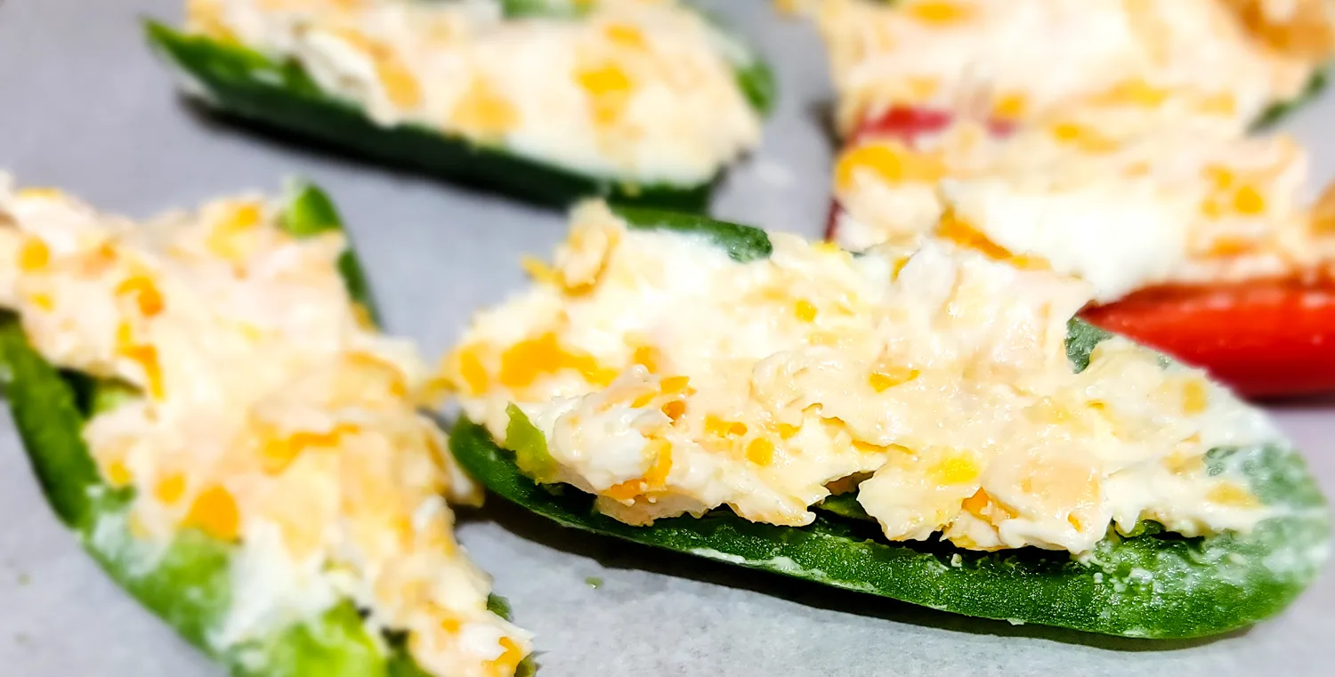 filling the poppers with low carb cheesy filling. 