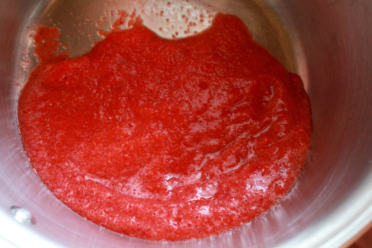 making strawberry jam in pot