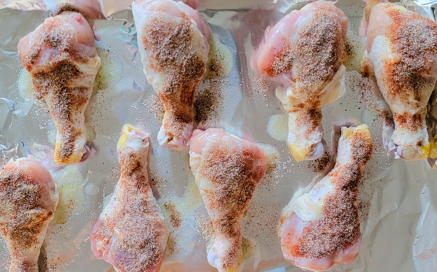 dry rub for chicken legs on baking sheet 