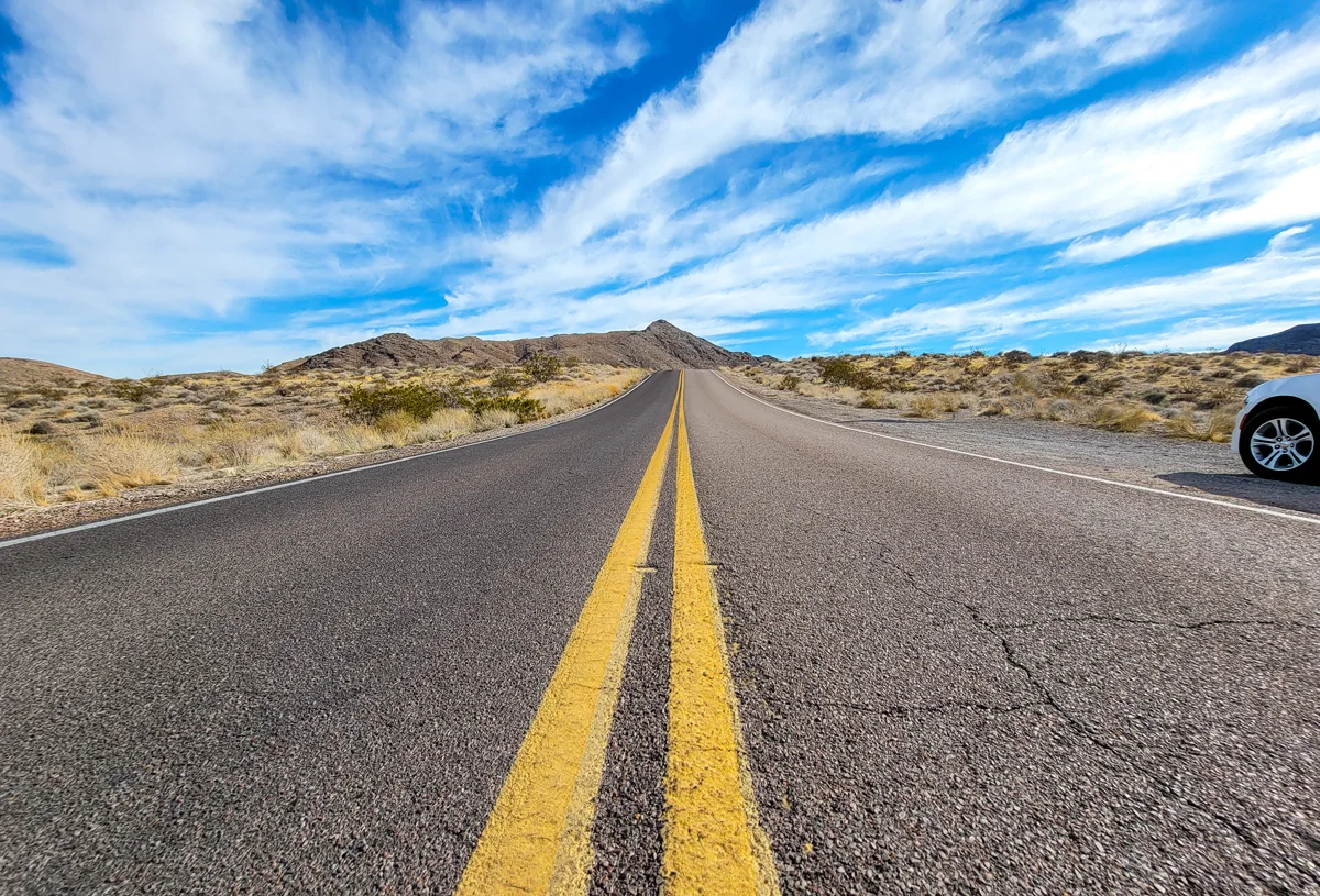 close up of road and car with keto foods. 