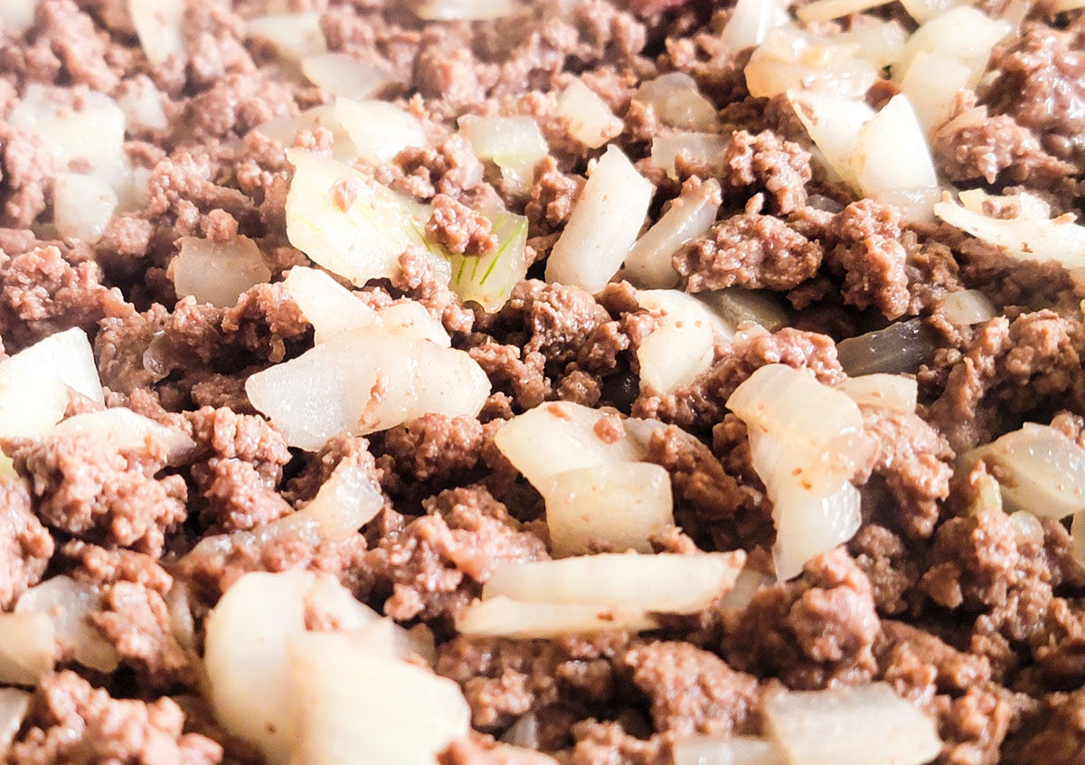 browning ground meat and onions in skillet