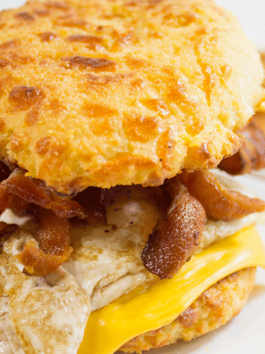 Keto Air Fryer Biscuits used as breakfast sandwich with eggs.