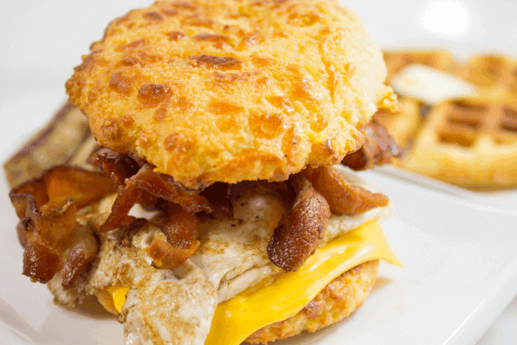 Keto Air Fryer Biscuits used as breakfast sandwich with eggs.