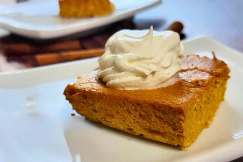Crustless keto pumpkin cheesecake cut into individual squares